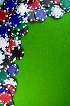 Many poker chips on casino table